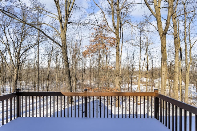 view of snow covered deck