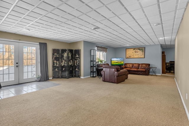 carpeted living room with french doors