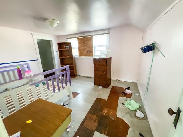 bedroom featuring lofted ceiling