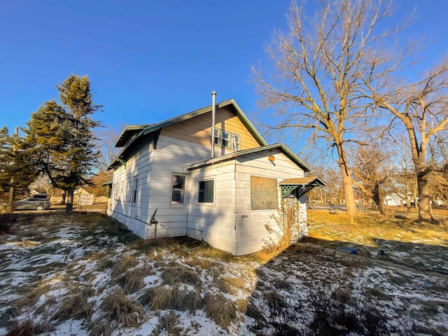 view of snow covered property