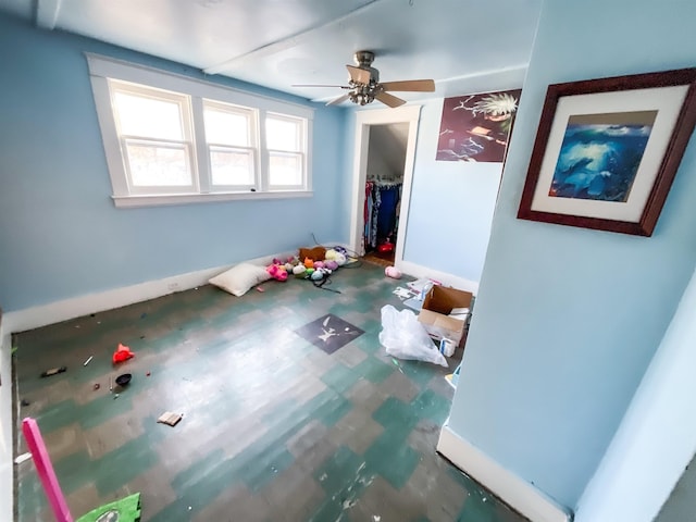 unfurnished bedroom with ceiling fan