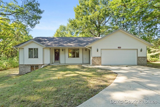 view of front facade featuring a garage and a front lawn