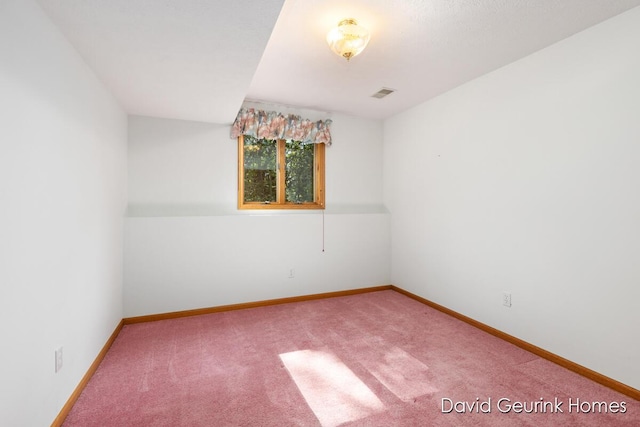 unfurnished room with carpet