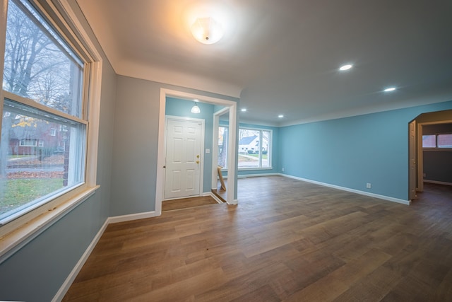 interior space with dark hardwood / wood-style floors