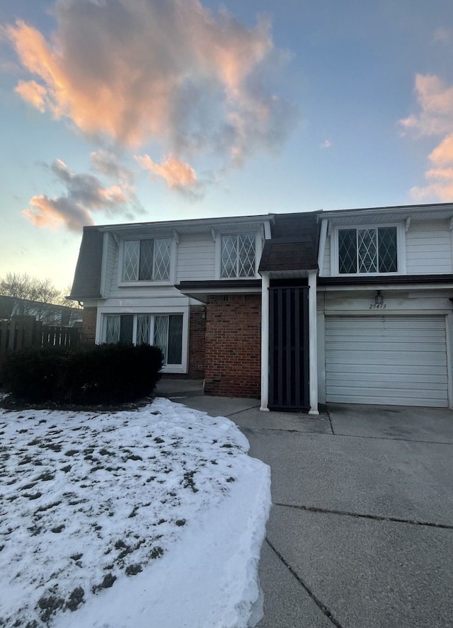 view of front of property with a garage