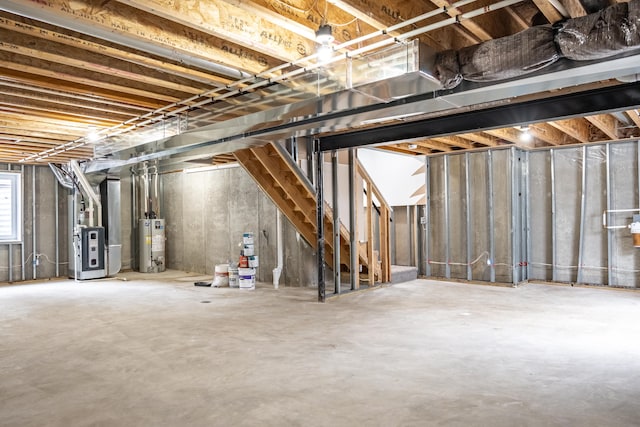 basement with heating unit and gas water heater