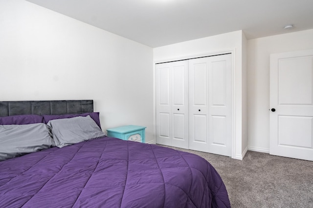 carpeted bedroom featuring a closet