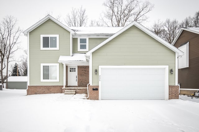 view of front of property with a garage