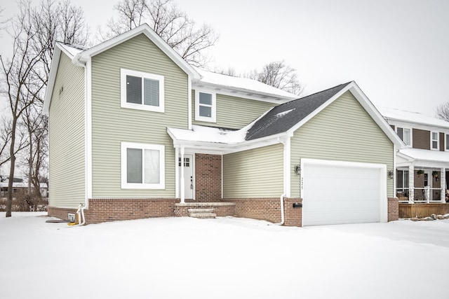 front facade with a garage