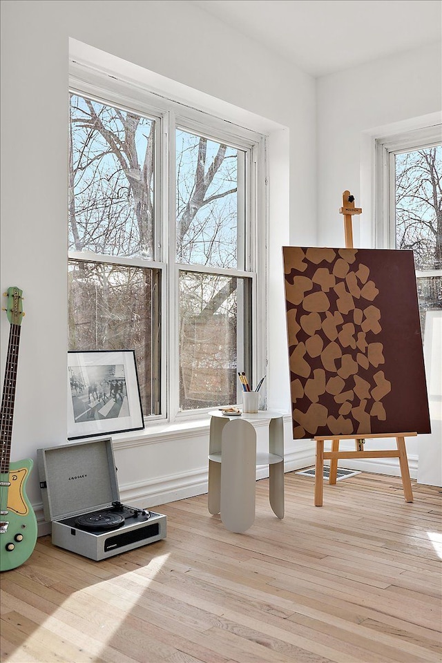 sitting room with light hardwood / wood-style floors