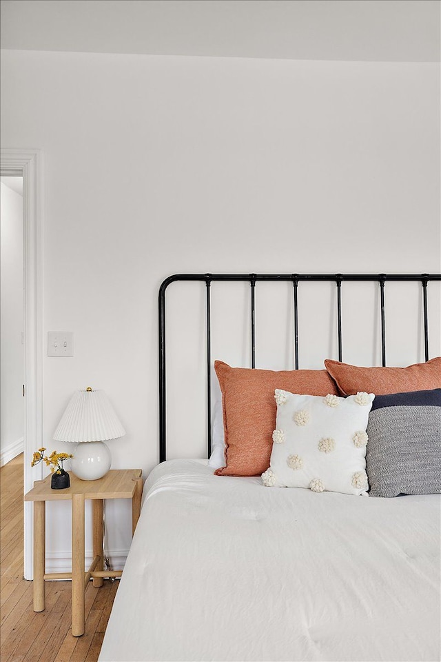 bedroom featuring hardwood / wood-style flooring