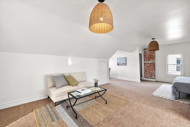 carpeted living room with lofted ceiling