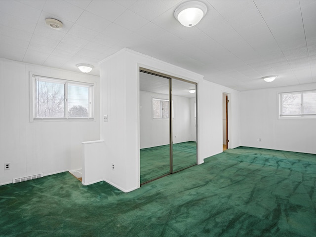 basement featuring carpet floors