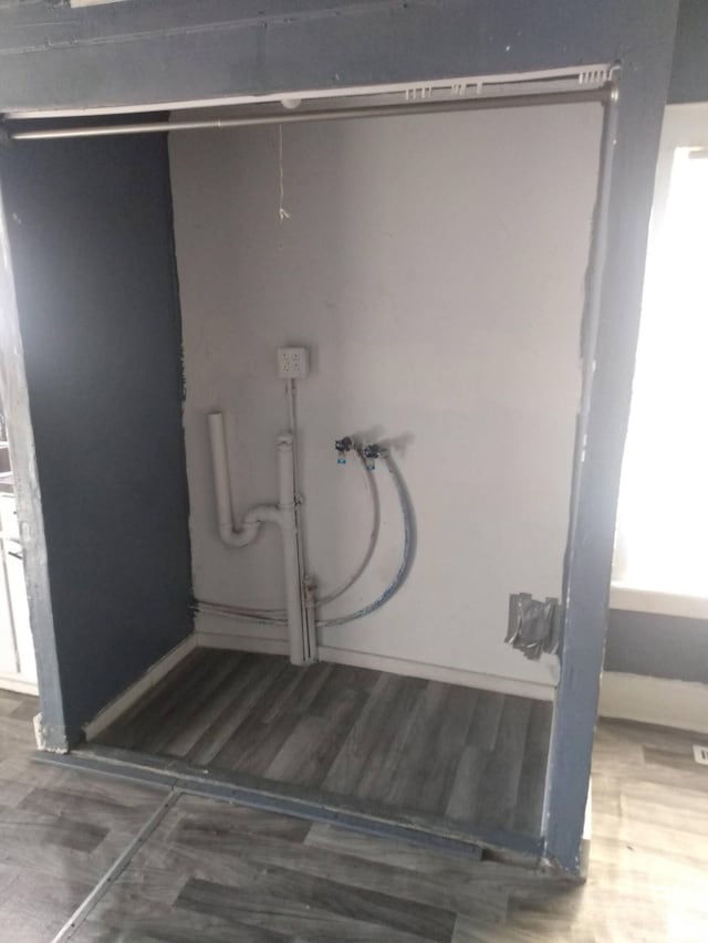 2908 Hoyt St, Muskegon Heights, MI 49444 - bathroom featuring baseboards