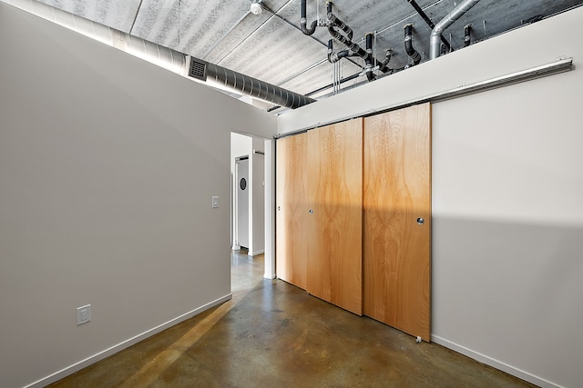 unfurnished bedroom featuring a closet