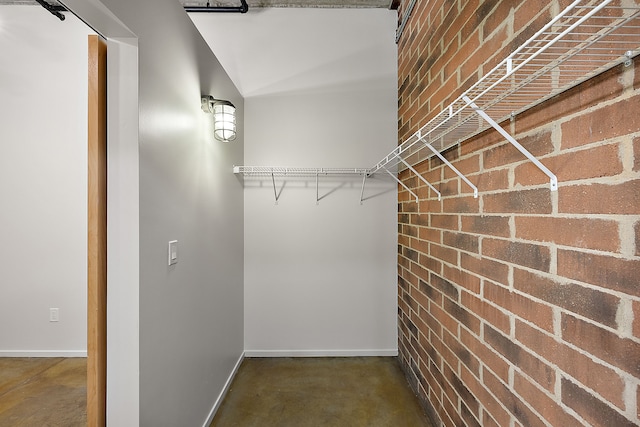 spacious closet featuring lofted ceiling