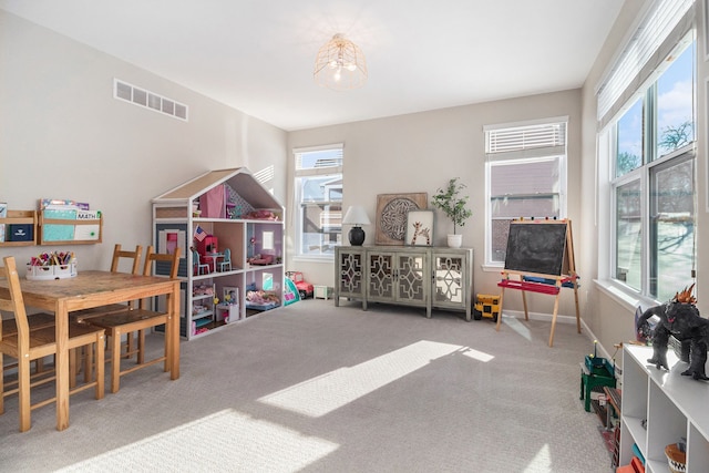 game room featuring a healthy amount of sunlight and carpet floors