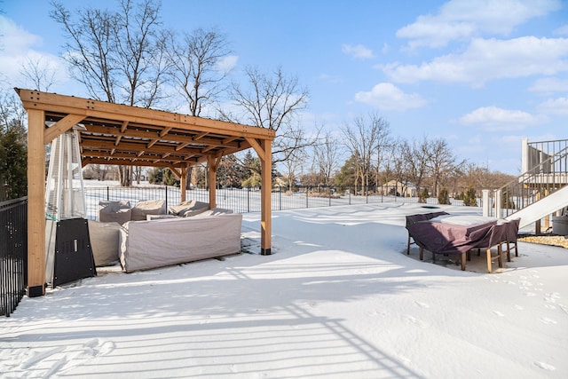 view of snow covered deck