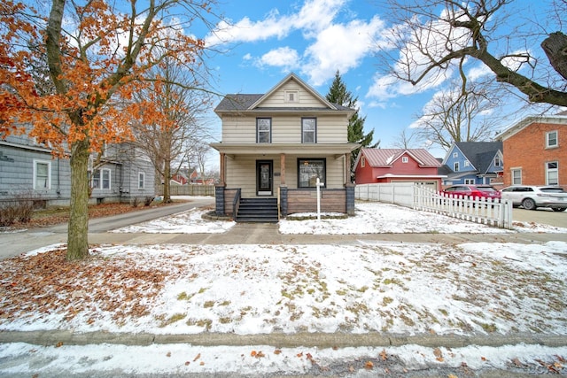 front of property featuring covered porch