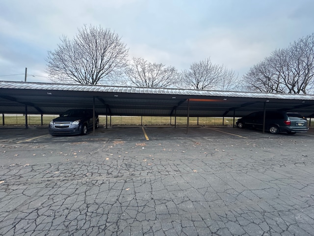 view of parking featuring a carport