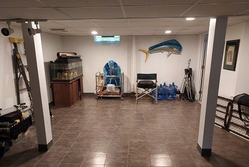 16146 Chapel St, Detroit, MI 48219 - exercise room with a paneled ceiling, recessed lighting, and tile patterned flooring