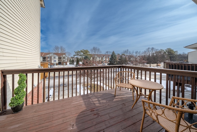 view of snow covered deck