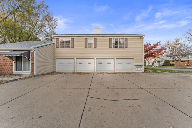 view of property exterior featuring a garage