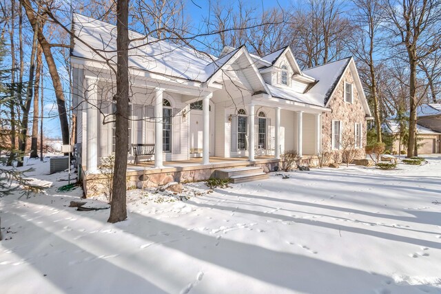 310 Sycamore St, Litchfield, MI 49252 - cape cod home featuring covered porch