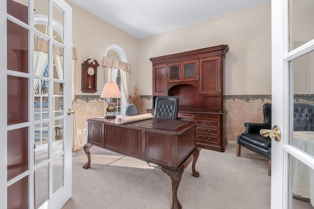 310 Sycamore St, Litchfield, MI 49252 - carpeted home office featuring french doors, tile walls, and wainscoting