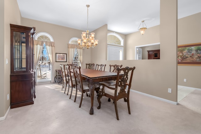 310 Sycamore St, Litchfield, MI 49252 - dining room with an inviting chandelier, carpet flooring, and baseboards