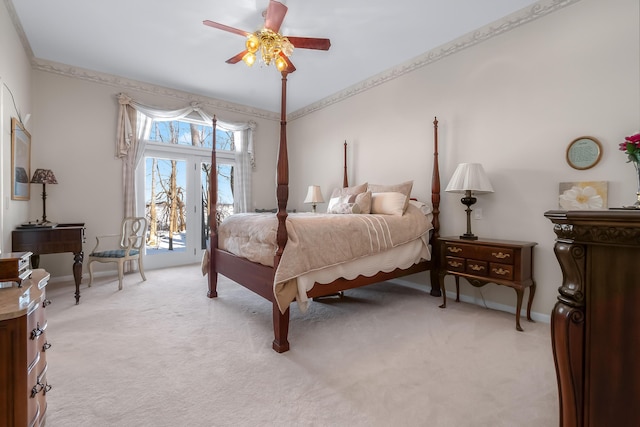 310 Sycamore St, Litchfield, MI 49252 - bedroom featuring crown molding, baseboards, access to outside, a ceiling fan, and light carpet