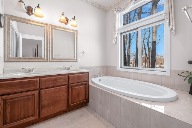 310 Sycamore St, Litchfield, MI 49252 - full bath with a wealth of natural light, a sink, and a garden tub
