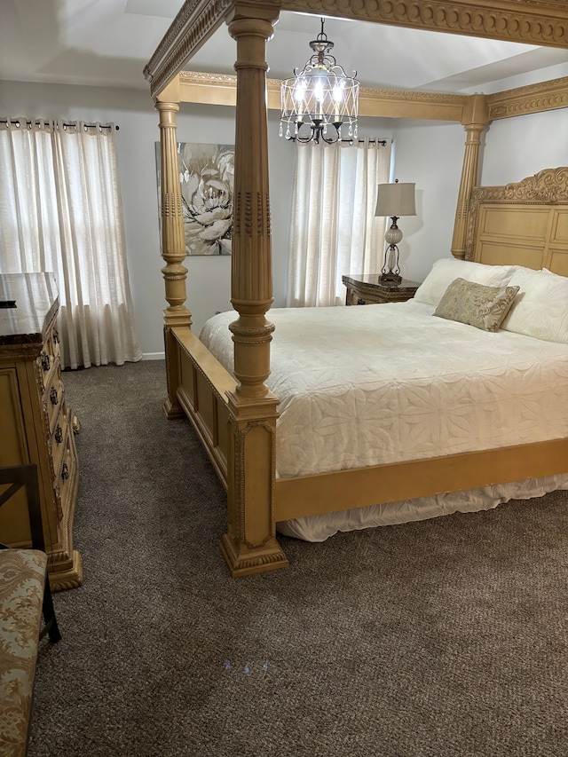 carpeted bedroom featuring ornate columns