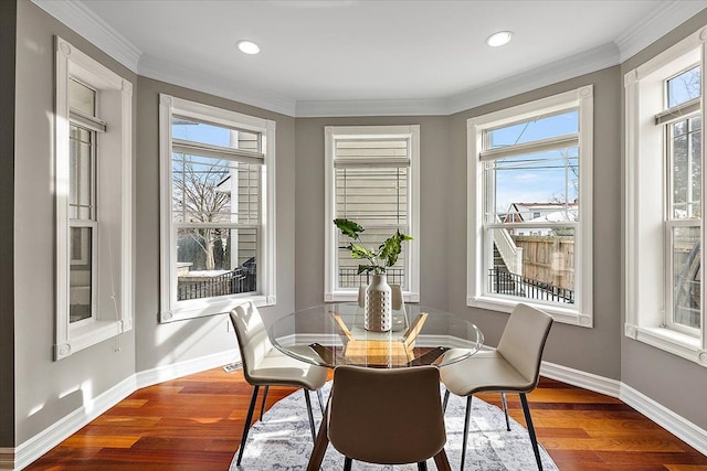 dining area with a healthy amount of sunlight and wood finished floors