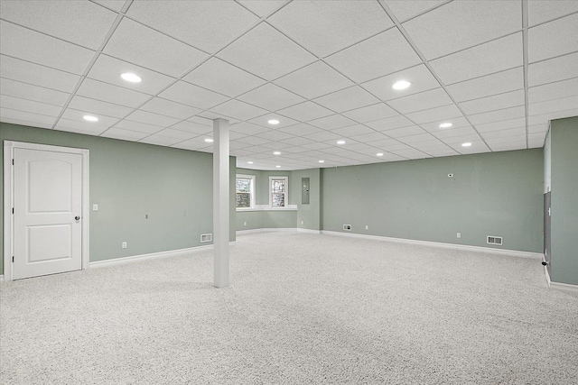 below grade area with carpet floors, recessed lighting, visible vents, and baseboards