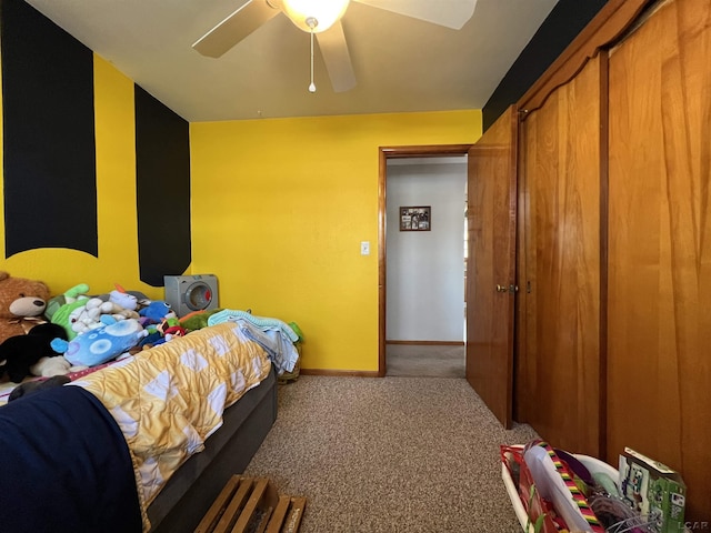 carpeted bedroom featuring ceiling fan