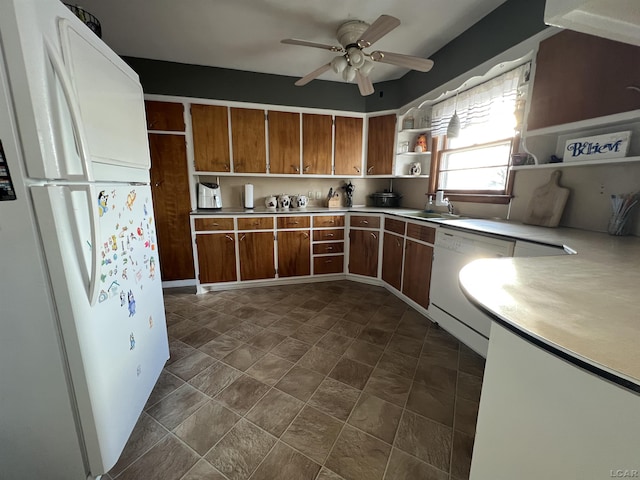 kitchen featuring sink, white appliances, and ceiling fan