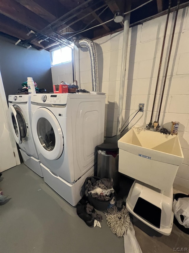 laundry area with washer and clothes dryer