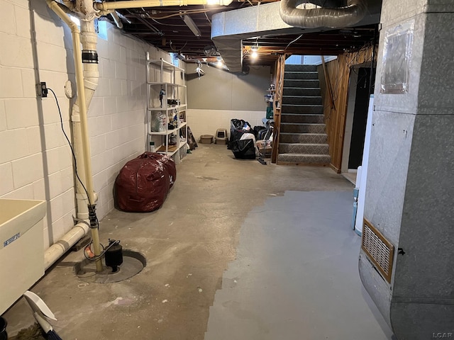 basement featuring heating unit