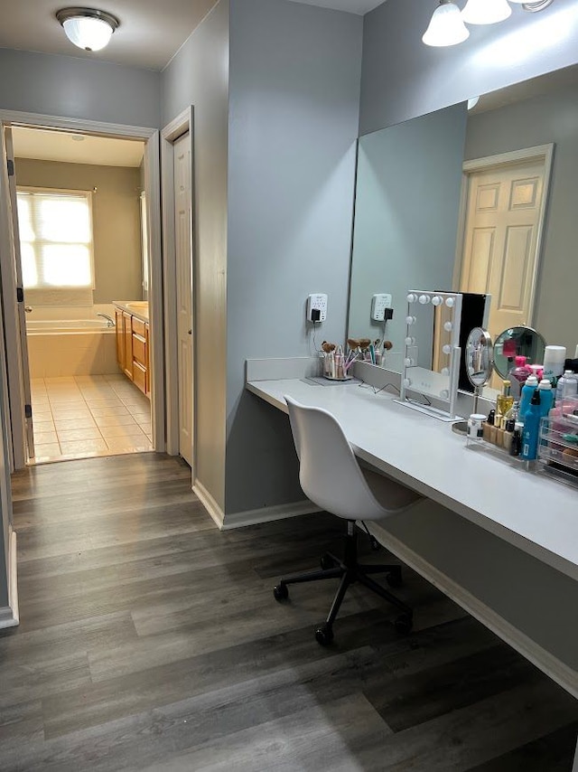 interior space with light wood-type flooring and baseboards