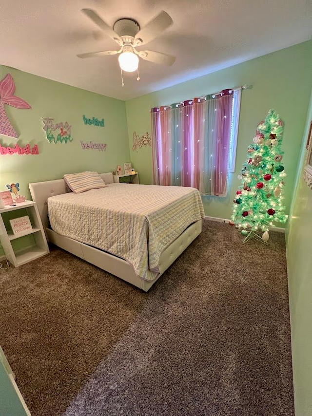 bedroom featuring ceiling fan and carpet flooring