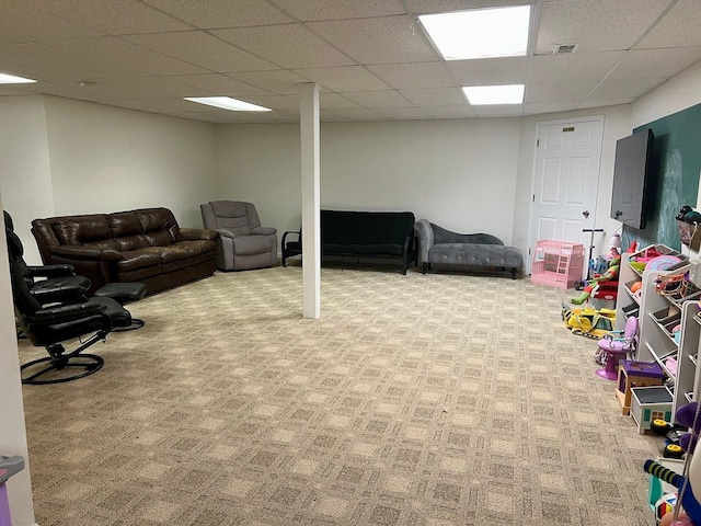 119 Prestwick Trl, Highland, MI 48357 - carpeted living room with visible vents and a drop ceiling
