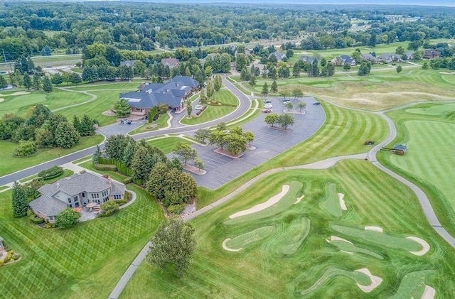 bird's eye view with view of golf course