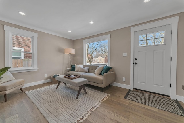 foyer entrance with light hardwood / wood-style flooring