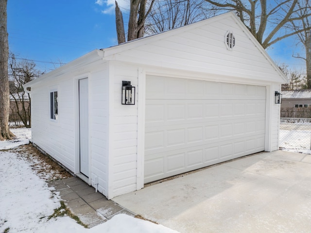 view of snow covered garage