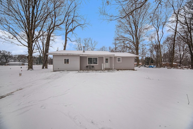 view of snow covered property