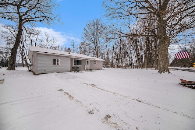 view of snow covered property