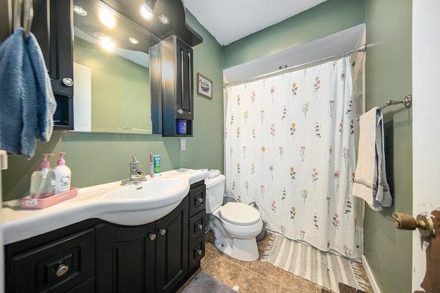 bathroom with toilet, tile patterned floors, walk in shower, and vanity