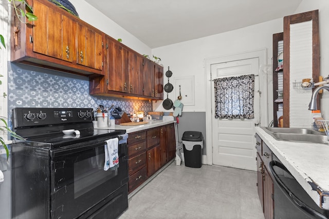 kitchen with decorative backsplash, sink, dishwashing machine, and black electric range oven