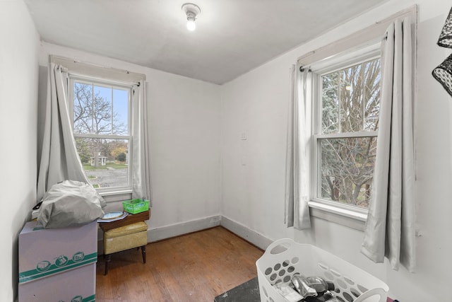 sitting room with hardwood / wood-style floors